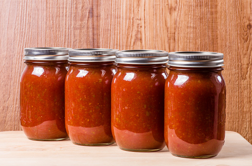 Freshly made tomato sauce in mason jars