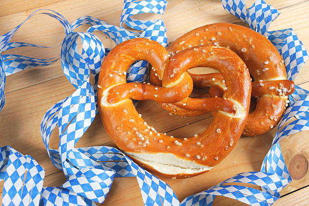 istock Salty pretzels on wooden board 532134541
