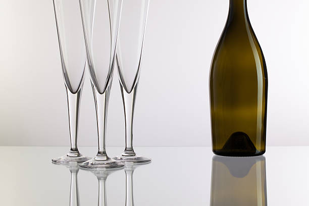 istock Empty champagne glasses on the glass desk 532134875