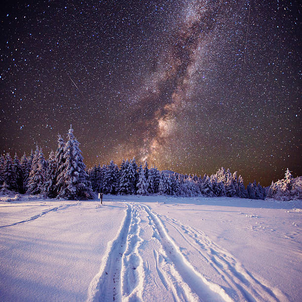 istock fantastic winter meteor shower and the snow-capped mountains 532135653