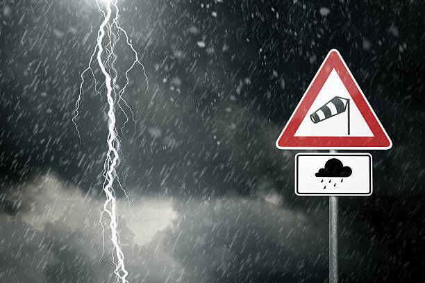 Bad Weather - Caution - Risk of Storm and Thunderstorms bad weather - caution - risk of storm and thunderstorms road warning sign photos stock pictures, royalty-free photos & images