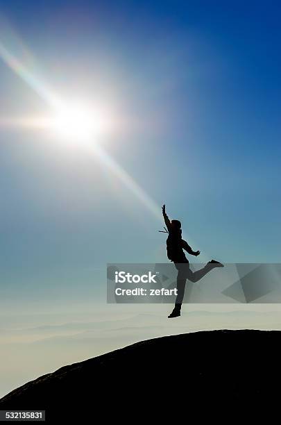 Heaven Man Silhouette Jumping Reaching The Sun Stock Photo - Download Image Now - Child, Reaching, Jumping