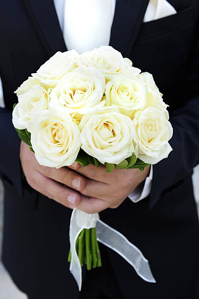 istock bouquet of white roses 532137413