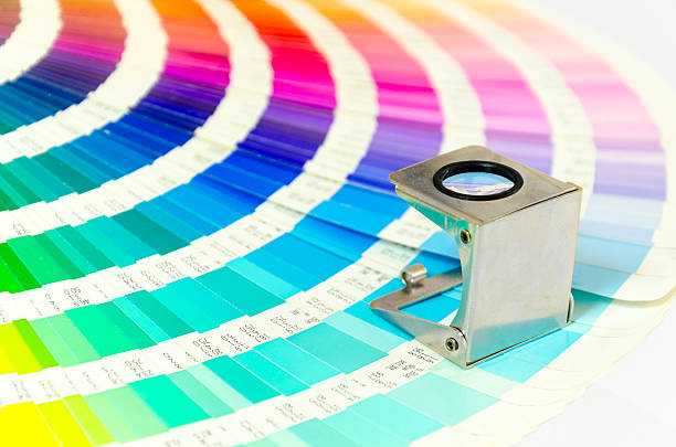 istock Magnifying glass standing on color guide on a white background 532149339