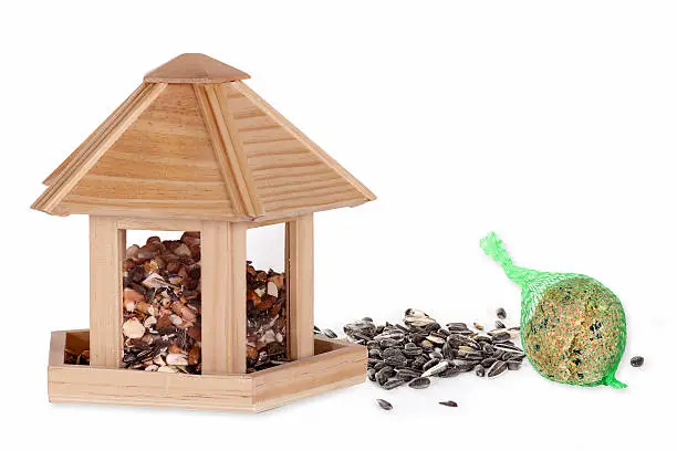 Bird box with different bird seed for winter.