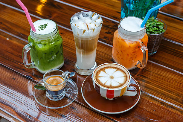 istock tea and coffee with milk on table in cafe 532151155