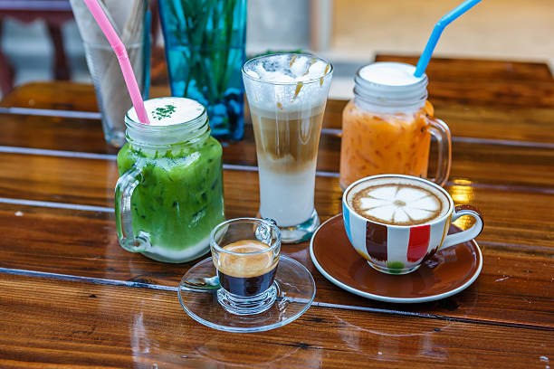 istock tea and coffee with milk on table in cafe 532151159