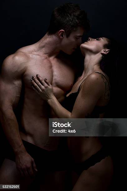 Couple Romancing Together Stock Photo - Download Image Now - 20-24 Years, 20-29 Years, 2015