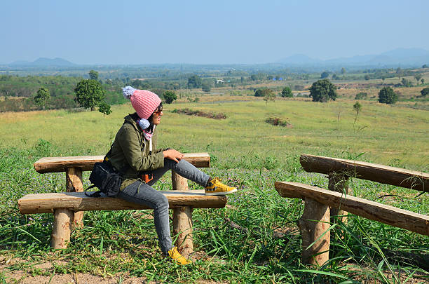 istock Thai woman sit for rest at Viewpoint in winter season 532152721