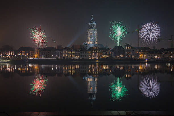 Deventer city at New Years Eve Deventer cityscape with fireworks deventer photos stock pictures, royalty-free photos & images