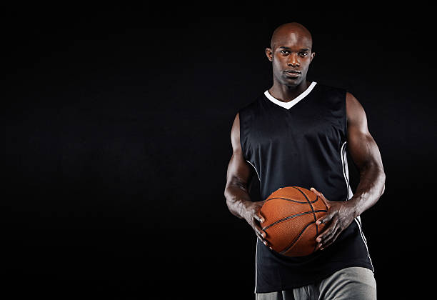 istock Black basketball player with ball 532167697