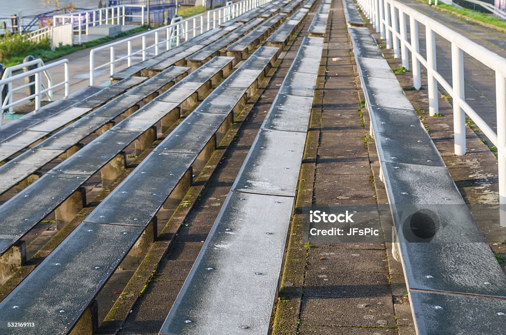 Long rows of seats Long rows of seats for spectators at a sporting event. 2015 Stock Photo