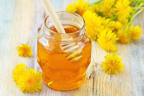 istock Flower honey in glass jar 532169556