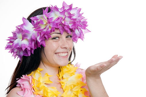 Pretty smiling girl in a hawaiian wreath 