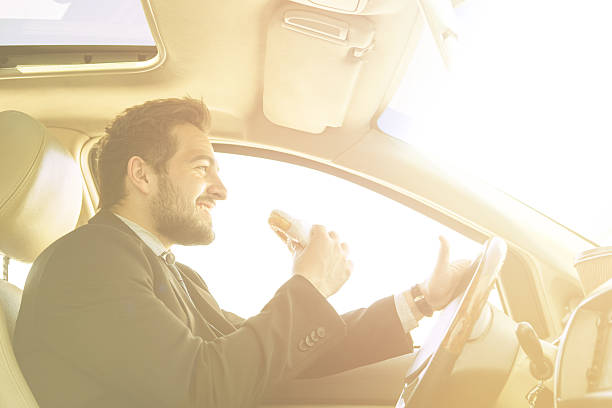 istock Businessman eating on to go 532171150