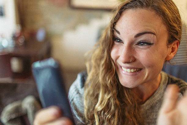 istock Young woman and her mobile phone 532171630