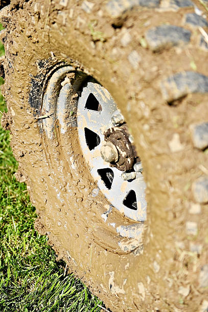 istock Off road wheel and tire full of mud 532171640
