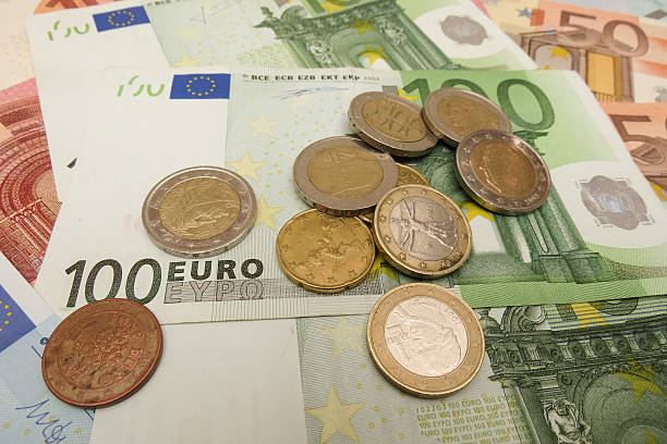 istock Euro banknotes and coins 532171786