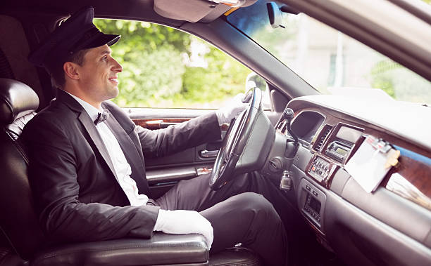 istock Limousine driver driving and smiling 532172347