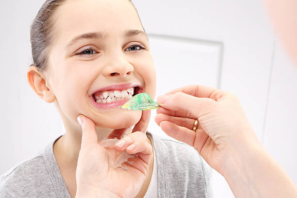 Child with orthodontic appliance