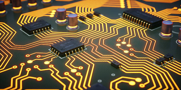 amarillo y circuitos de microchip en primer plano - computer science defocused macro fotografías e imágenes de stock