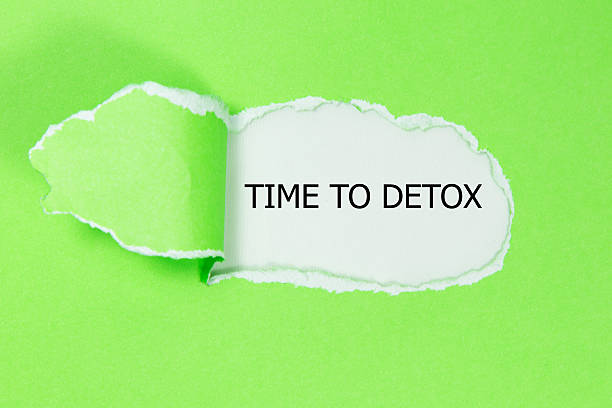 istock time to detox written under torn paper 532176368