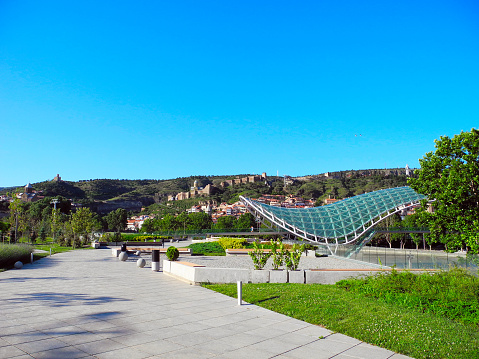 Landscape Peace Bridge and Fortress Narikala in Tbilisi, Georgia.