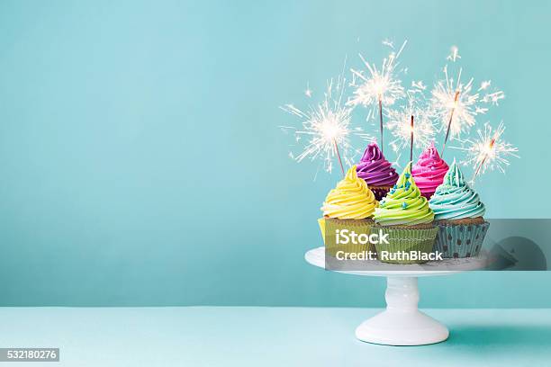 Cupcakes With Sparklers Stock Photo - Download Image Now - Cupcake, Birthday, Birthday Cake