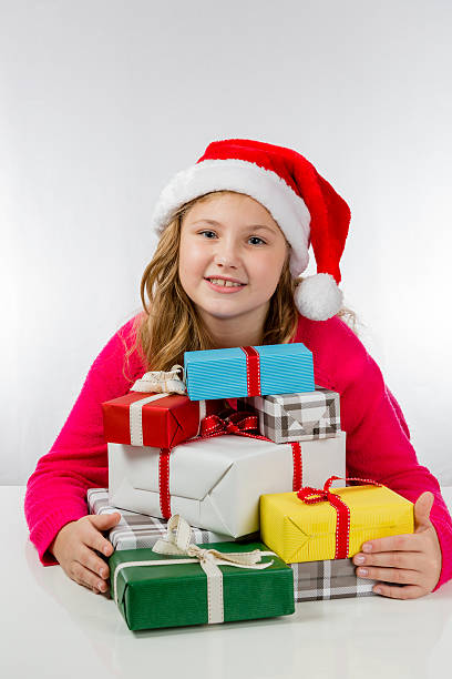 istock Girl is happy about Christmas presents 532181684