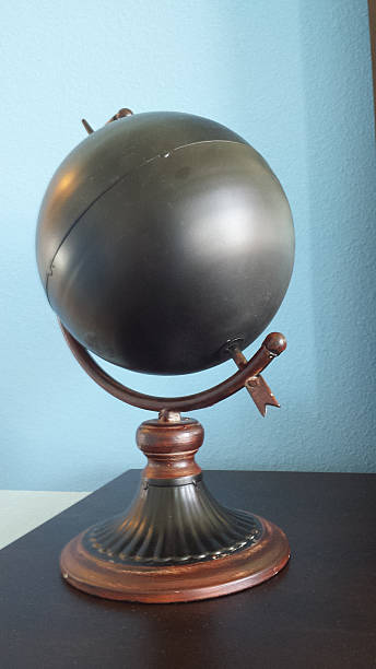 istock Globe Idea - Globe Concept - Metal Ball on Axis Stand 532181808
