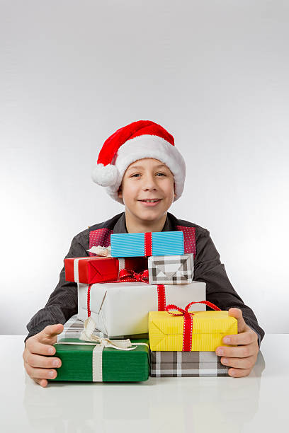 istock Boy is glad about Christmas presents 532182080