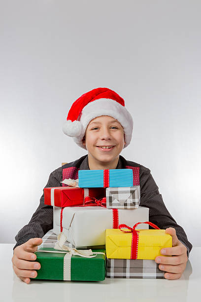 istock Boy is glad about Christmas presents 532182110