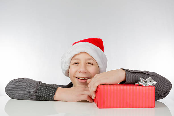 istock Boy is pleased about his Christmas present 532182396