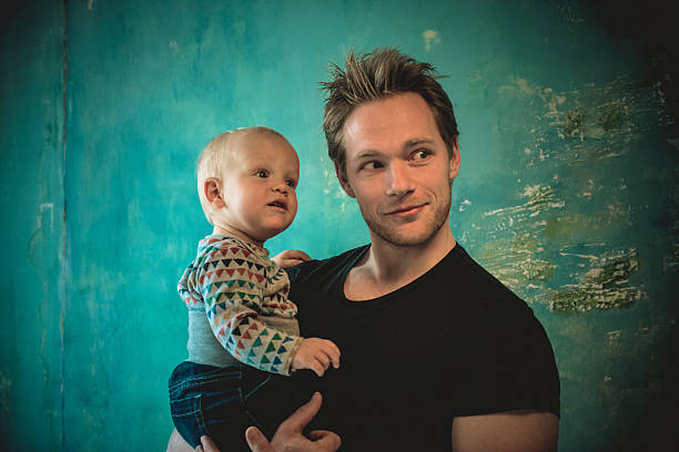 istock Handsome Young Father Holding His Son, Paris, France 532182954