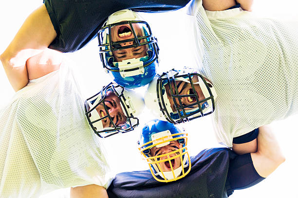 istock american football players posing 532184547