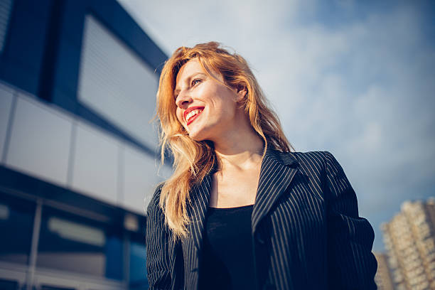 istock Lady in front of her firm 532185594