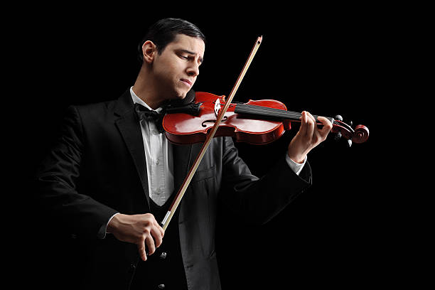 istock Studio shot of a classical violinist playing a violin 532185735