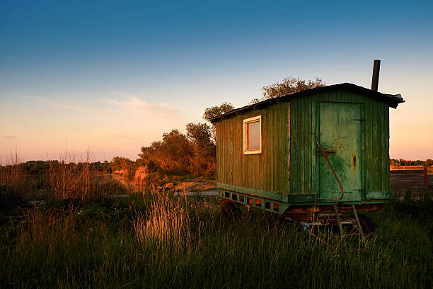 istock Old caravan on field countryside sunset 532186676