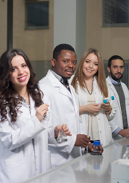 istock Group of young medical workers are working in lab 532186790