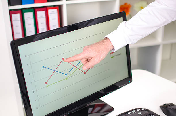istock Businessman showing a graph on the screen 532187219