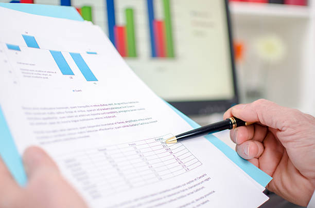 istock Hand of businessman holding an economic document 532187225