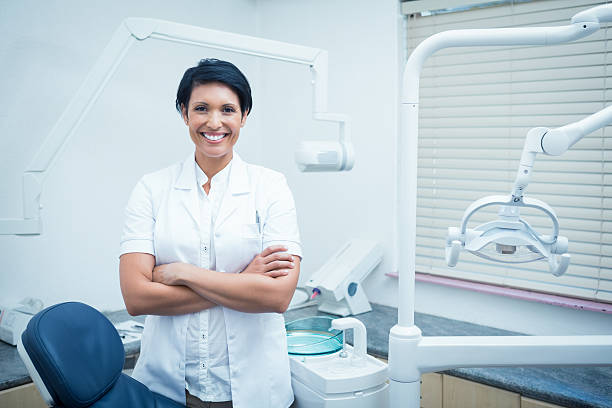 istock Female dentist with arms crossed 532187229