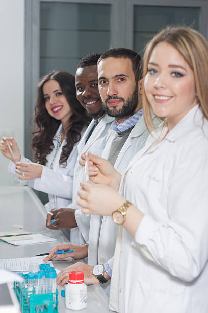 istock Group of young medical workers are working in lab 532187342