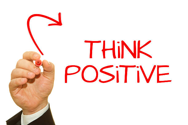 istock Businessman hand writing Think Positive 532187450