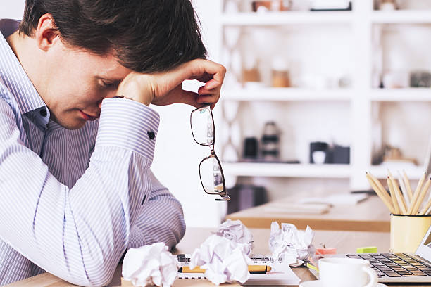 istock Stressed businessman with glasses 532188300