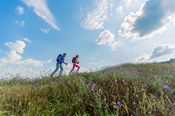 istock Young couple hiking on the mountain 532188921