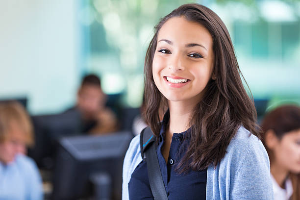 istock Beautiful teen private school student in computer lab 532190397