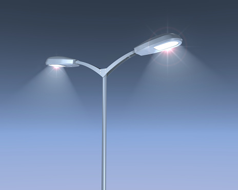 3D illustration of shining street lamps post on blue night sky. 