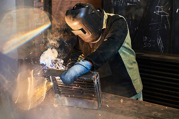 istock The welder produces welding parts 532192020