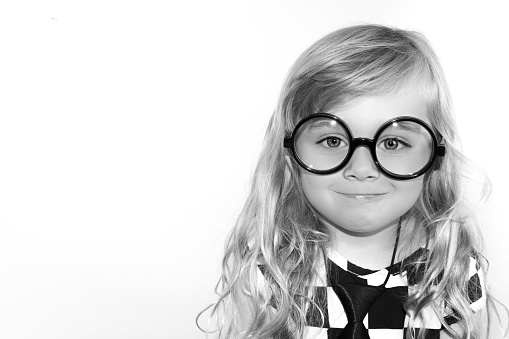 Black and White Photo of Toddler Girl Wearing Geek Glasses